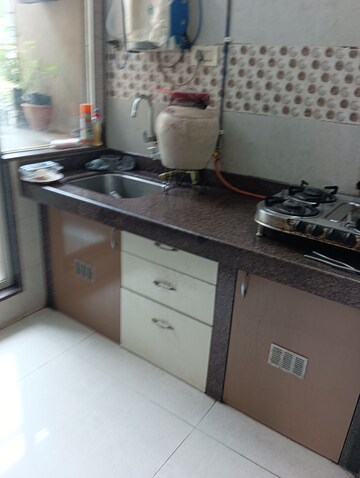 Kitchen in 1 BHK Apartment at Ajmera New Era, Kalyan West – for Sale
