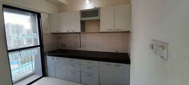 Kitchen, man-opus 2 Bedroom 650 Sq.Ft. Apartment In Mira Road Thane 8787017