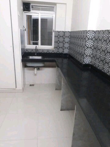 Kitchen in 1 BHK Apartment at Lodha Amara, Kolshet Road – for Sale