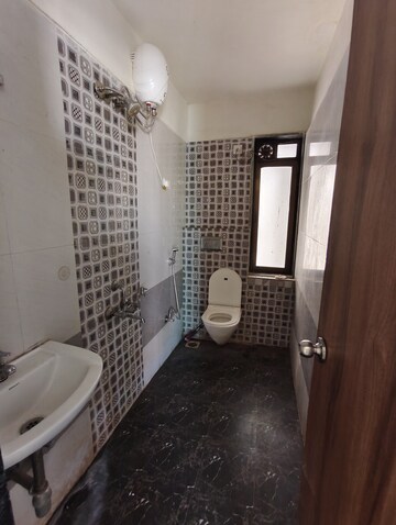 Bathroom in 1 BHK Apartment at Raj G N Residency, Mira Road – for Rent