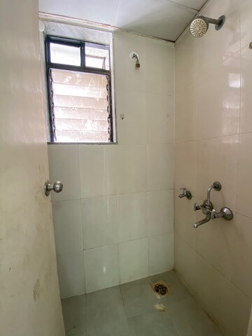 Bathroom in 1 BHK Apartment at Lodha Golden Dream, Dombivli East – for Rent