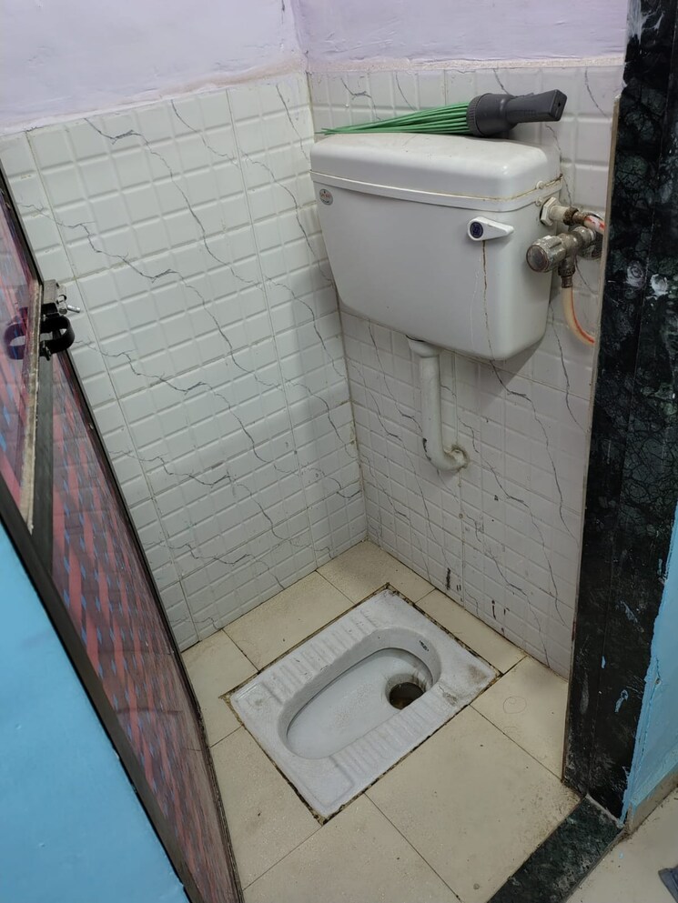 Bathroom, yashodhan-chs-kopar-khairane 2 Bedroom 700 Sq.Ft. Apartment In Kopar Khairane Sector 20 Navi Mumbai 8787156