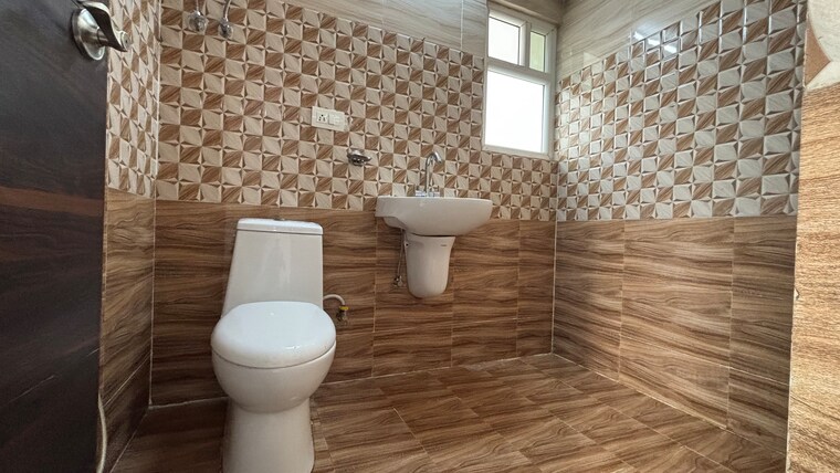 Bathroom, white-orchid 2 Bedroom 1097 Sq.Ft. Apartment In Sector 84 Noida 8787297