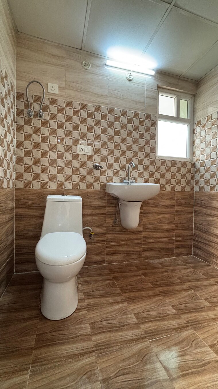 Bathroom, white-orchid 2 Bedroom 1097 Sq.Ft. Apartment In Sector 84 Noida 8787297