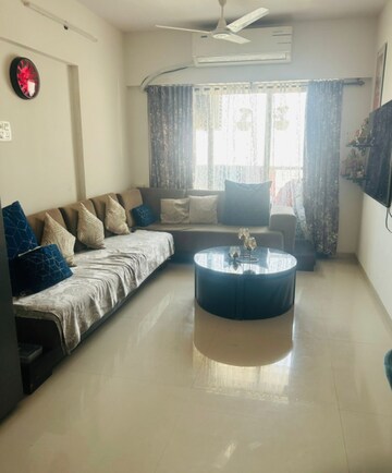 Living Room in 2 BHK Apartment at Cosmopolis Tower, Andheri West – for Rent