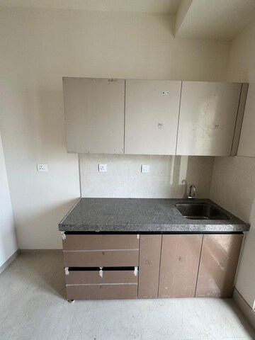 Kitchen in 2 BHK Apartment at Piramal Vaikunth, Balkum Pada – for Rent