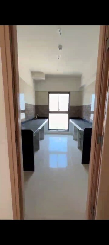 Kitchen in 2 BHK Apartment at Rajesh Raj Infinia, Malad West – for Sale