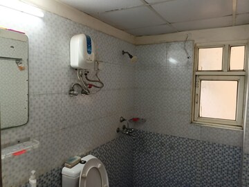 Bathroom in 2 BHK Apartment at Gardenia Golf City, Sector 75 – for Rent