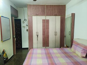 Bedroom in 1 BHK Apartment at Dheeraj Presidency, Kandivali West – for Sale