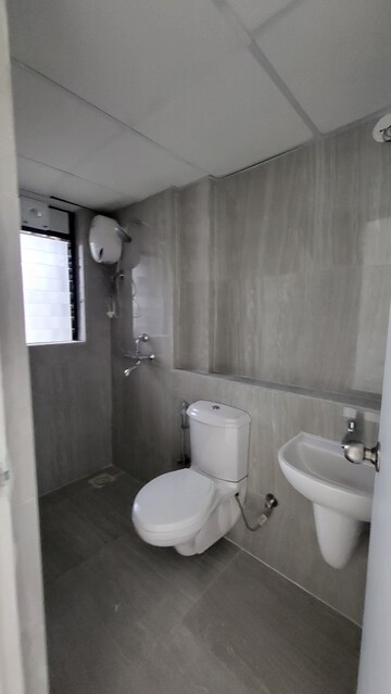 Bathroom in 1 BHK Apartment at Runwal Gardens, Dombivli East – for Rent
