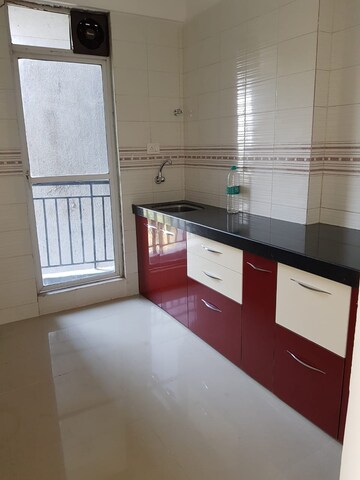 Kitchen in 2 BHK Apartment at Tanvi Eminence, Mira Road – for Sale