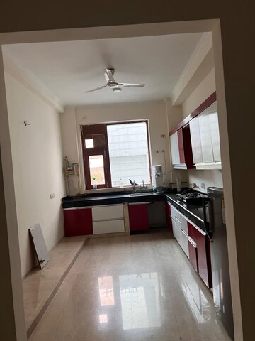 Kitchen in 4 BHK Apartment at Godrej Tropical Isle, Sector 146 – for Sale