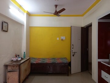 Living Room in 1 BHK Apartment at Raunak Heights, Ghodbunder Road – for Sale