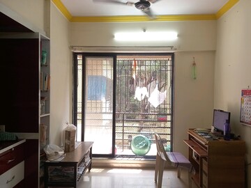 Living Room in 1 BHK Apartment at Raunak Heights, Ghodbunder Road – for Sale