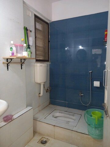 Bathroom in 1 BHK Apartment at Raunak Heights, Ghodbunder Road – for Sale
