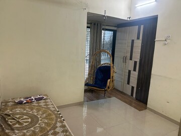 Living Room in 2 BHK Apartment at Omkar Hira Chamber CHS, Thane West – for Rent