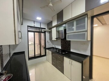 Kitchen in 2 BHK Apartment at Sunteck City Avenue 2, Goregaon West – for Rent