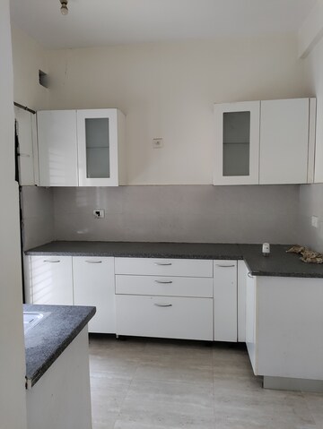 Kitchen in 3 BHK Builder Floor at Puri Aman Vilas, Sector 89 – for Sale