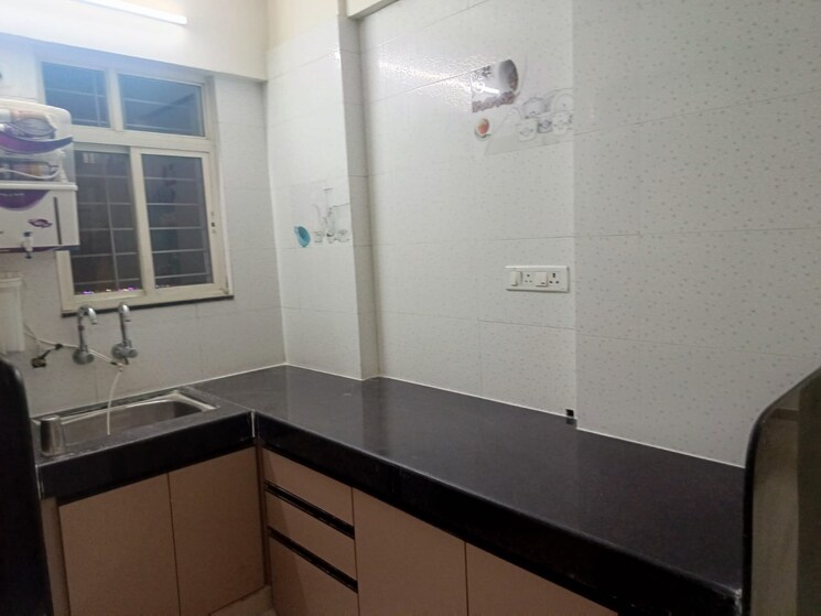 Kitchen, supertech-defence-colony-phase-iv 1 Bedroom 660 Sq.Ft. Apartment In Wagholi Pune 8787889