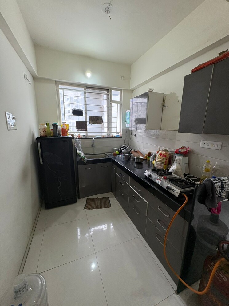 Kitchen, saheel-itrend-homes-phase-2 2 Bedroom 700 Sq.Ft. Apartment In Hinjewadi Pune 8787915