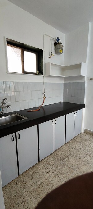 Kitchen in 1 BHK Builder Floor at Kachnar CHS Vasant Vihar, Vasant Vihar – for Sale