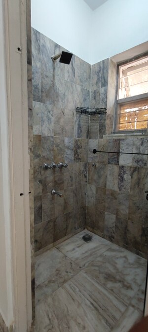 Bathroom in 1 BHK Builder Floor at Kachnar CHS Vasant Vihar, Vasant Vihar – for Sale