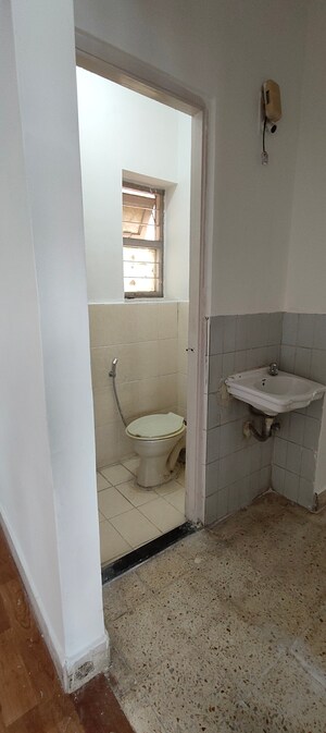 Bathroom in 1 BHK Builder Floor at Kachnar CHS Vasant Vihar, Vasant Vihar – for Sale