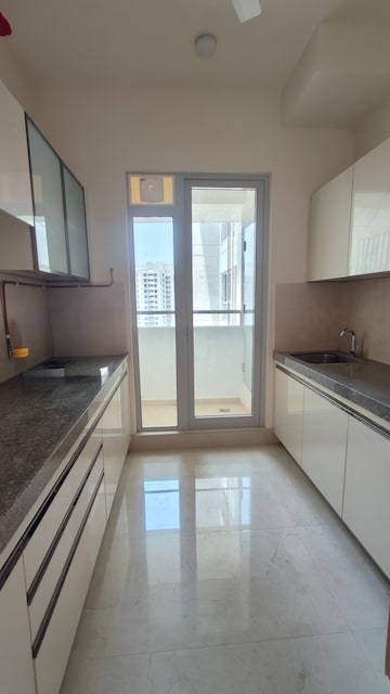 Kitchen in 2 BHK Apartment at Piramal Vaikunth, Balkum Pada – for Rent