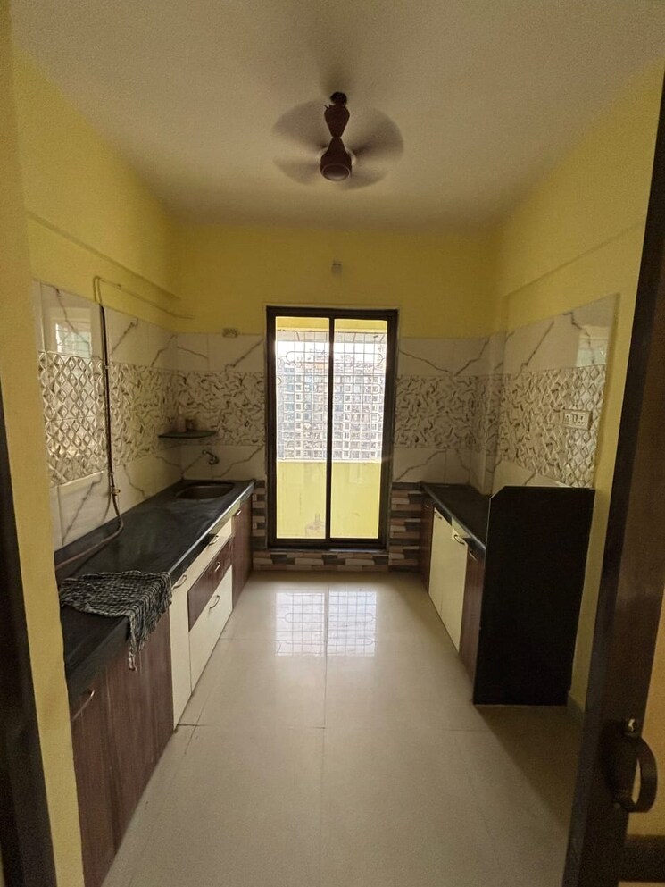 Kitchen, evergreen-city 2 Bedroom 850 Sq.Ft. Apartment In Mira Road Thane 8788165