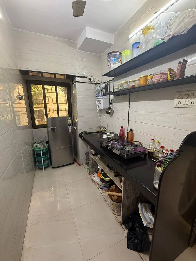 Kitchen, lokhandwala complex 2 Bedroom 700 Sq.Ft. Apartment In Lokhandwala Complex Mumbai 8788169