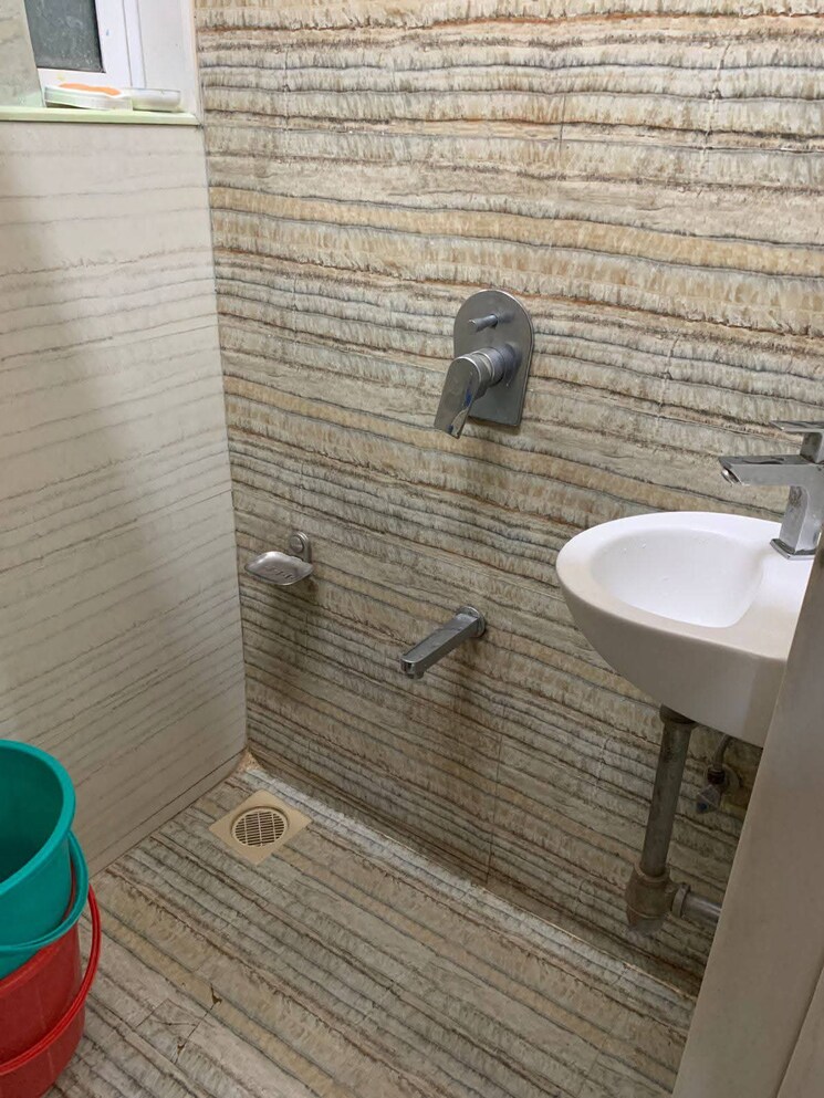 Bathroom, satyam-chs-andheri-west 2 Bedroom 695 Sq.Ft. Apartment In Andheri West Mumbai 8788175