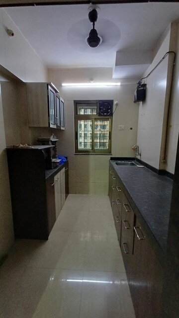 Kitchen in 2 BHK Apartment at Dosti Vihar, Samata Nagar – for Rent