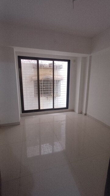 Bedroom in 2 BHK Apartment at Mahajan CHS, Naupada – for Rent