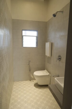 Bathroom in 1 BHK Apartment at Unicorn Global Arena, Naigaon East – for Sale