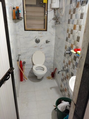 Bathroom in 1 BHK Apartment at Aditya Eksar Kavita, Borivali West – for Rent