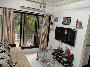 Living Room in 1 BHK Apartment at Aditya Eksar Kavita, Borivali West – for Rent