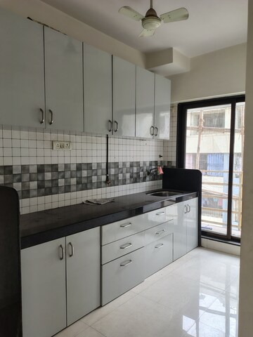 Kitchen in 2 BHK Apartment at Prathamesh Krupa Kedar Darshan, Andheri West – for Rent