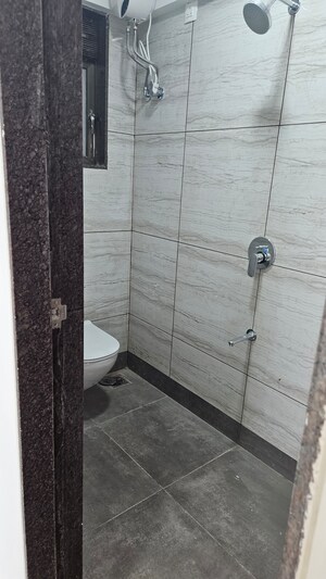 Bathroom in 1.5 BHK Apartment at New Ambivali, Andheri West – for Sale