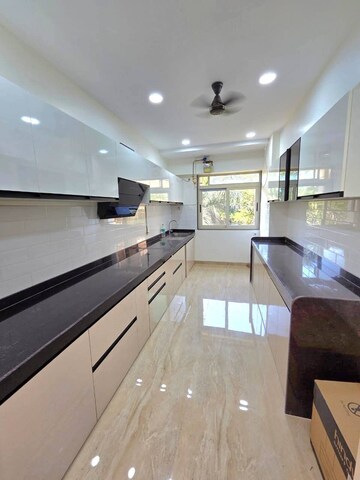 Kitchen in 3 BHK Apartment at Rustomjee 7 JVPD, Juhu – for Rent
