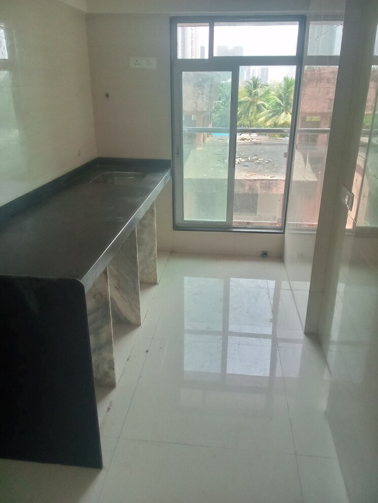 Kitchen, rainbow-chs-goregaon-west 1 Bedroom 690 Sq.Ft. Apartment In Goregaon West Mumbai 8788493