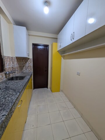 Kitchen in 2 BHK Apartment at Signature The Millennia 2, Sector 37d – for Rent