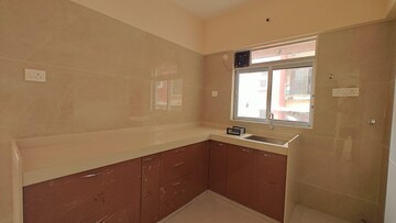 Kitchen in 1.5 BHK Apartment at Omkara Unchai, Borivali West – for Sale