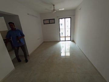 Living Room in 1.5 BHK Apartment at Lodha Palava City Lakeshore Greens, Dombivli East – for Sale