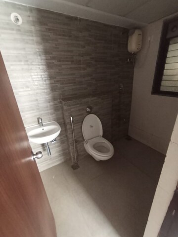 Bathroom in 1.5 BHK Apartment at Lodha Palava City Lakeshore Greens, Dombivli East – for Sale