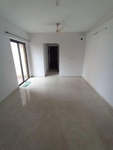 Living Room in 1 BHK Apartment at Lodha Palava City Lakeshore Greens, Dombivli East – for Sale