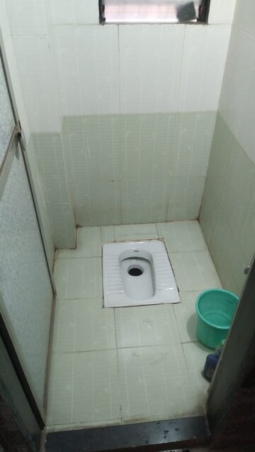 Bathroom in 2 BHK Apartment at Trisangam CHS, Dombivli West – for Rent