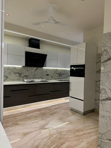 Kitchen in 4 BHK Builder Floor at DLF Atria, Dlf Phase ii – for Sale