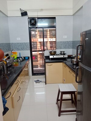 Kitchen in 1 BHK Apartment at Dombivli West – for Sale