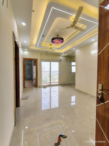 Living Room in 2 BHK Apartment at Amrapali Enchante, Tech Zone 4 Greater Noida – for Rent