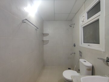 Bathroom in 2 BHK Apartment at Bhartiya Nikoo Homes, Thanisandra Main Road – for Sale